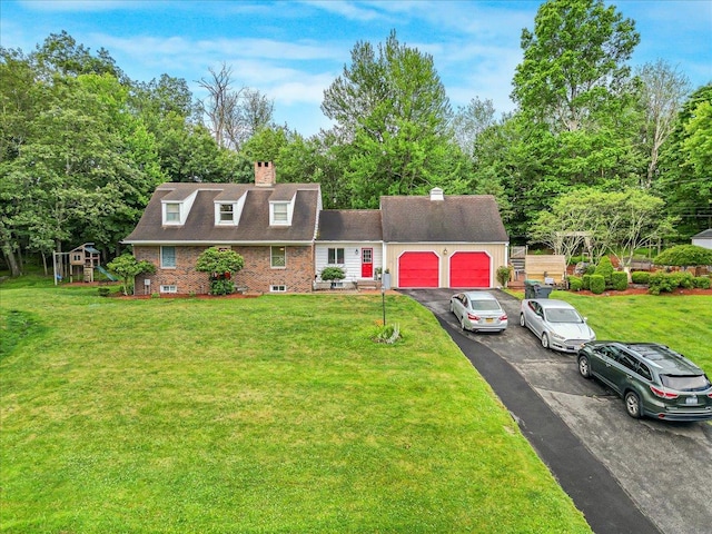 48 Eastview Rd, Highland Mills, NY 10930 - view of front of property featuring a garage, driveway, a chimney, and a front yard