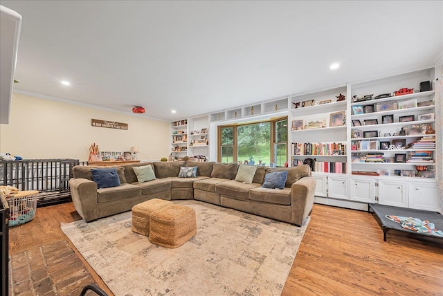 48 Eastview Rd, Highland Mills, NY 10930 - living area featuring ornamental molding, built in features, wood finished floors, and recessed lighting