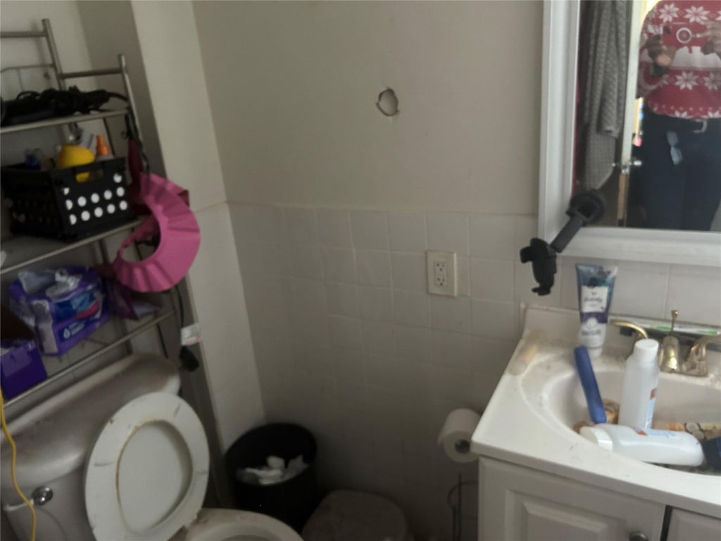19 Westside Ave, Bay Shore, NY 11706 - half bath with vanity and tile walls