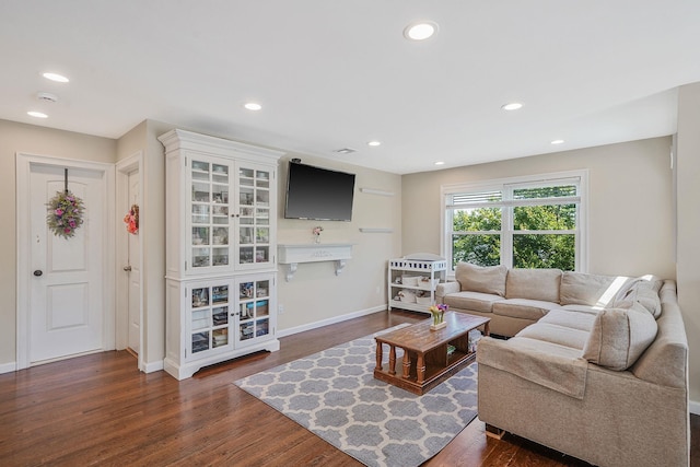43 E Jackson Ave, Babylon, NY 11702 - living area featuring dark wood-style floors and recessed lighting
