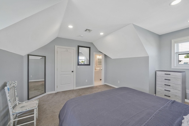 43 E Jackson Ave, Babylon, NY 11702 - bedroom with carpet floors, vaulted ceiling, recessed lighting, and ensuite bathroom