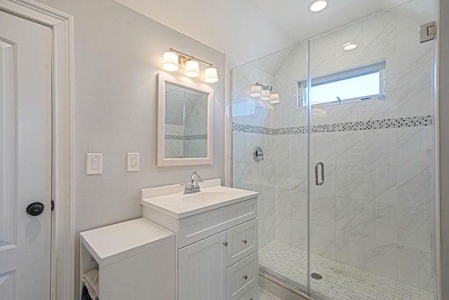 43 E Jackson Ave, Babylon, NY 11702 - full bathroom featuring vanity and a shower stall