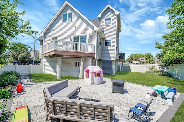 43 E Jackson Ave, Babylon, NY 11702 - rear view of house featuring a patio, an outdoor living space with a fire pit, a fenced backyard, and a gate