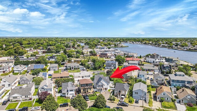 43 E Jackson Ave, Babylon, NY 11702 - aerial view of residential area with a nearby body of water