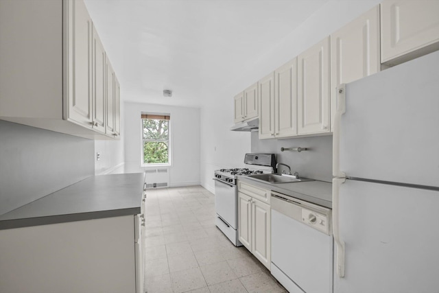 111-15 75th Ave Unit 4K, Forest Hills, NY 11375 - kitchen featuring white appliances, under cabinet range hood, radiator, light flooring, and white cabinets