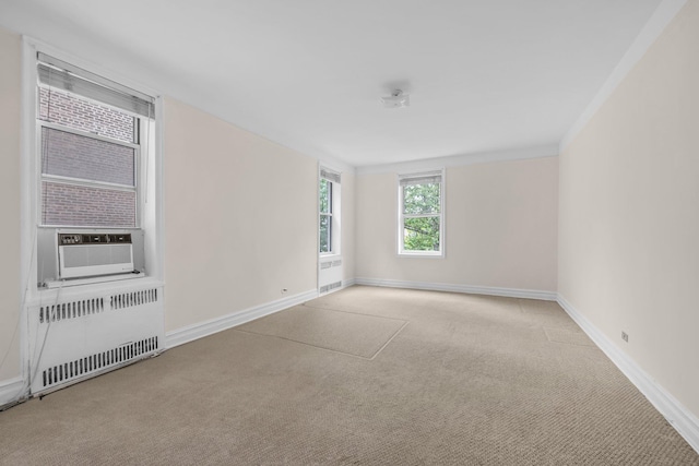 111-15 75th Ave Unit 4K, Forest Hills, NY 11375 - carpeted spare room with radiator and cooling unit