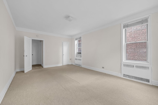 111-15 75th Ave Unit 4K, Forest Hills, NY 11375 - empty room with light colored carpet and crown molding