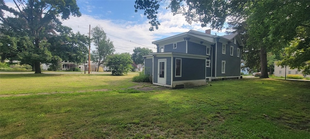 5-7 Myrtle Ave, Pine Plains, NY 12567 - rear view of property featuring a lawn and a chimney
