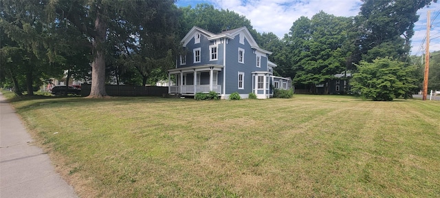 5-7 Myrtle Ave, Pine Plains, NY 12567 - view of front facade with covered porch and a front yard