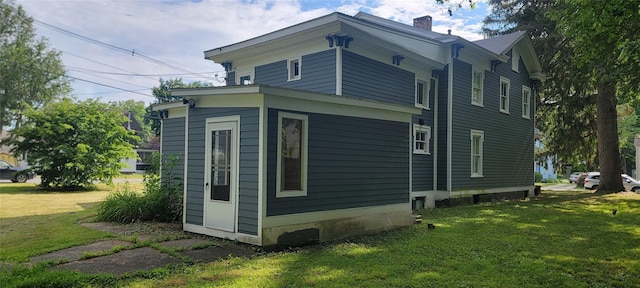 5-7 Myrtle Ave, Pine Plains, NY 12567 - view of side of property with a yard and a chimney