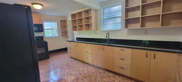 5-7 Myrtle Ave, Pine Plains, NY 12567 - kitchen with black appliances, open shelves, light brown cabinets, and dark countertops