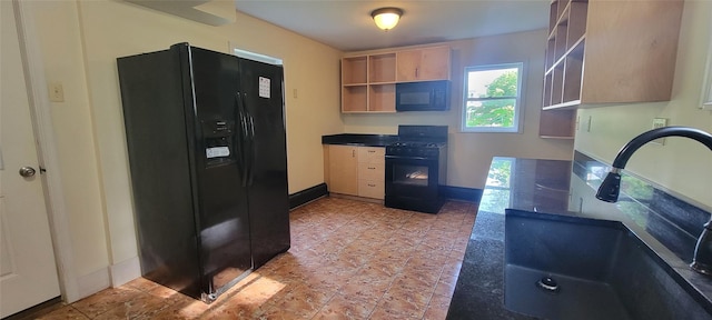 5-7 Myrtle Ave, Pine Plains, NY 12567 - kitchen featuring black appliances, open shelves, dark countertops, and light brown cabinetry