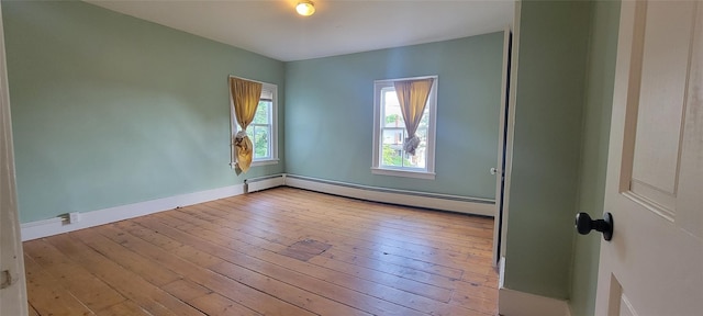 5-7 Myrtle Ave, Pine Plains, NY 12567 - empty room featuring a baseboard radiator and wood-type flooring