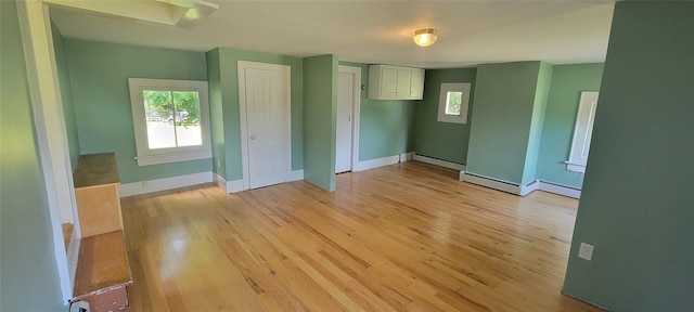 5-7 Myrtle Ave, Pine Plains, NY 12567 - spare room with light wood-type flooring, plenty of natural light, and a baseboard heating unit