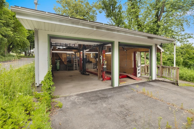 200 Ulster Ave, Ulster Park, NY 12487 - view of parking / parking lot featuring a garage