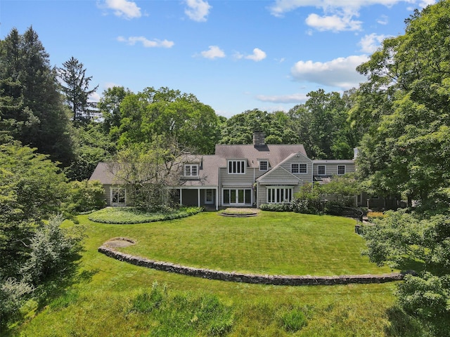 383 Pine Brook Rd, Bedford, NY 10506 - rear view of property with a lawn and a chimney