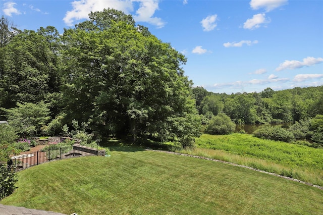 383 Pine Brook Rd, Bedford, NY 10506 - view of grassy yard with a garden and a wooded view