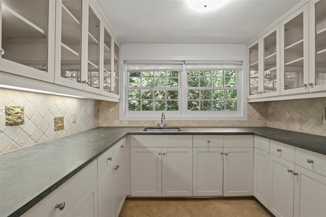 383 Pine Brook Rd, Bedford, NY 10506 - kitchen with backsplash, glass insert cabinets, dark countertops, and white cabinets