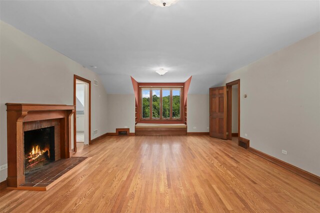 383 Pine Brook Rd, Bedford, NY 10506 - unfurnished living room featuring light wood-style floors and a fireplace