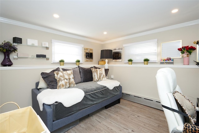 112 N Columbus Ave, Mount Vernon, NY 10553 - living area with a baseboard heating unit, crown molding, wood finished floors, and recessed lighting