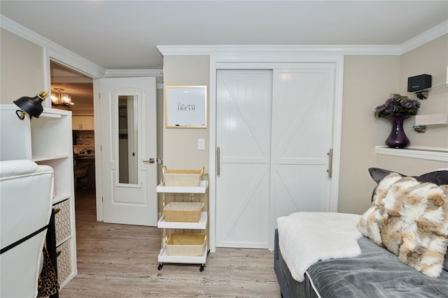 112 N Columbus Ave, Mount Vernon, NY 10553 - bedroom featuring light wood-type flooring, ornamental molding, and connected bathroom
