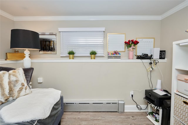 112 N Columbus Ave, Mount Vernon, NY 10553 - living area featuring a baseboard heating unit, wood finished floors, and crown molding