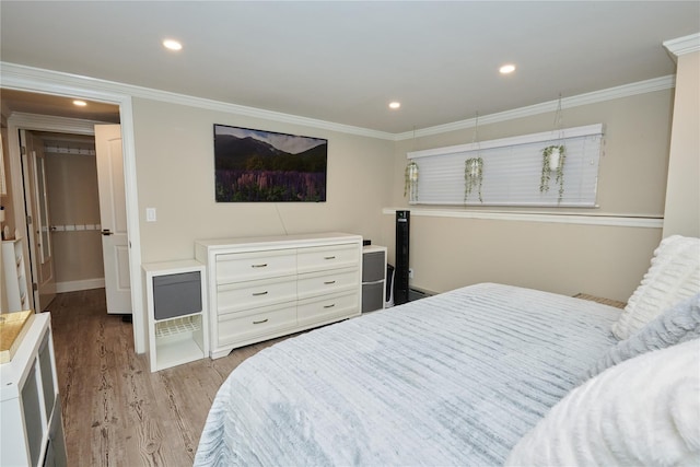 112 N Columbus Ave, Mount Vernon, NY 10553 - bedroom featuring light wood-style flooring, ornamental molding, and recessed lighting