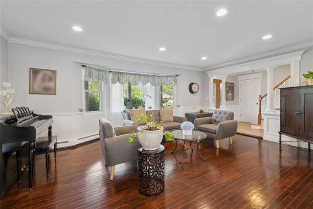 40 Spray Ct, Bayport, NY 11705 - living room featuring a baseboard radiator, wainscoting, crown molding, ornate columns, and hardwood / wood-style flooring