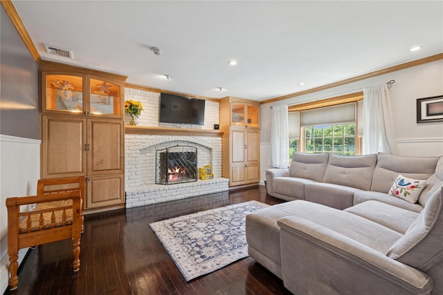 40 Spray Ct, Bayport, NY 11705 - living room with ornamental molding, wainscoting, a fireplace, dark wood finished floors, and recessed lighting