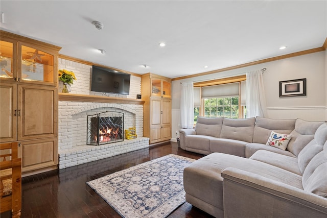 40 Spray Ct, Bayport, NY 11705 - living room featuring ornamental molding, a fireplace, a wainscoted wall, dark wood-type flooring, and recessed lighting
