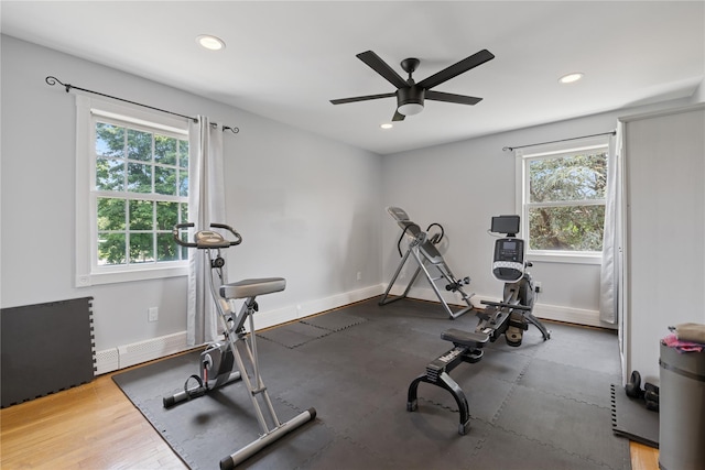 40 Spray Ct, Bayport, NY 11705 - workout area with healthy amount of natural light, a ceiling fan, recessed lighting, and baseboard heating