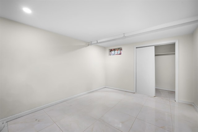 31 Pilgrim St, New Hyde Park, NY 11040 - unfurnished bedroom featuring baseboards and a closet
