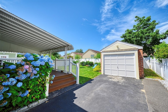 31 Pilgrim St, New Hyde Park, NY 11040 - detached garage with asphalt driveway
