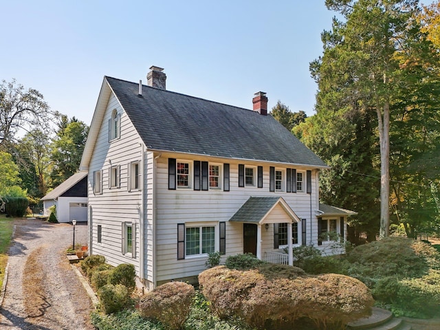 537 Moriches Rd, Head Of The Harbor, NY 11780 - colonial house with a chimney and roof with shingles