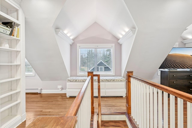537 Moriches Rd, Head Of The Harbor, NY 11780 - stairs with baseboard heating, wood finished floors, and lofted ceiling