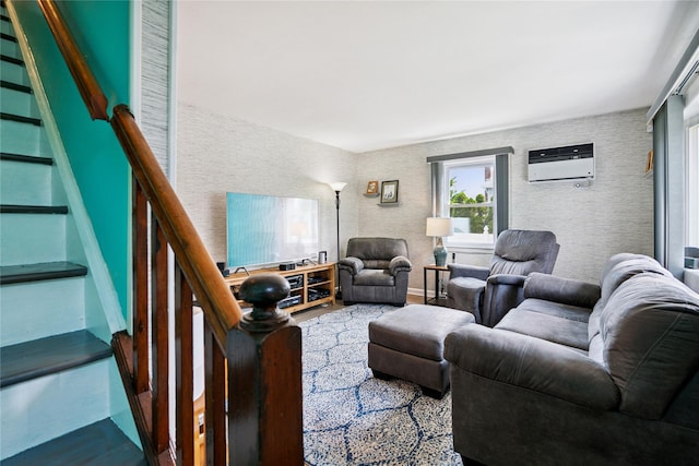 6 Vermont St, Lindenhurst, NY 11757 - living room featuring a wall mounted AC, wood finished floors, and stairs