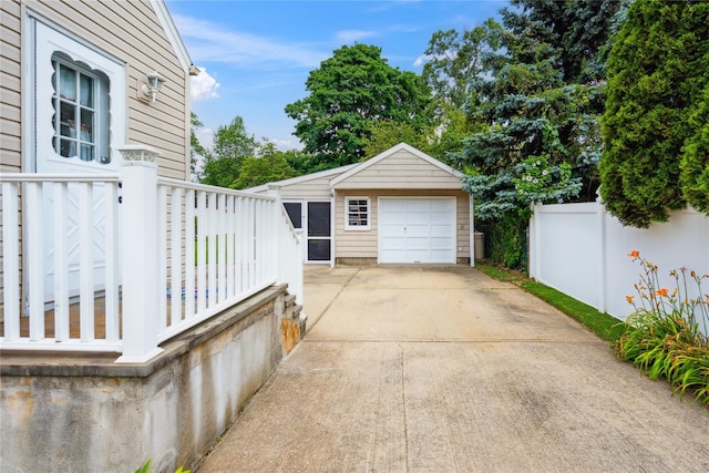 6 Vermont St, Lindenhurst, NY 11757 - detached garage featuring driveway