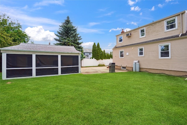 6 Vermont St, Lindenhurst, NY 11757 - back of property with a patio, a sunroom, and a chimney