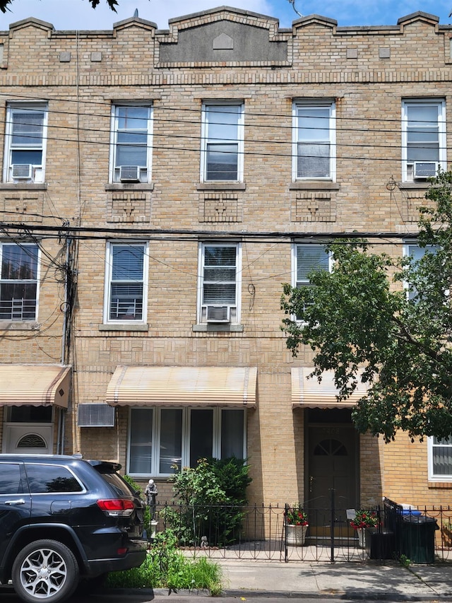 7408 15th Ave, Brooklyn, NY 11228 - view of front of home with cooling unit and brick siding