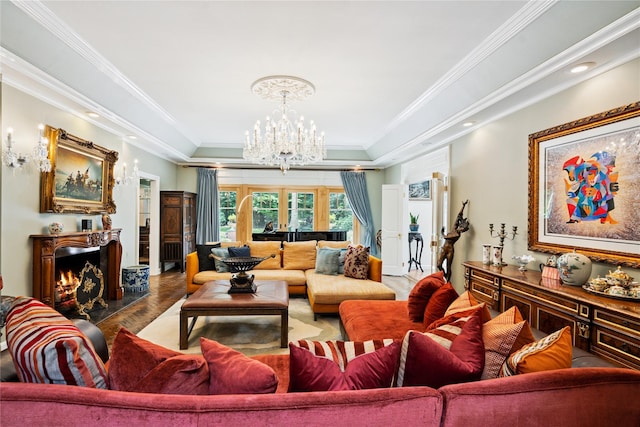 10 Laurel Woods Dr, Upper Brookville, NY 11771 - living area with a chandelier, a raised ceiling, crown molding, and a lit fireplace