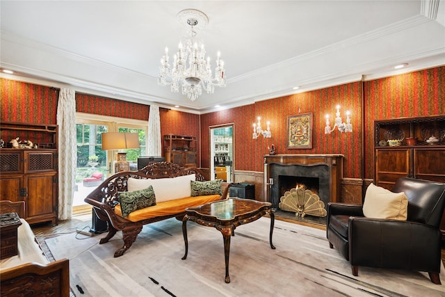 10 Laurel Woods Dr, Upper Brookville, NY 11771 - living room featuring a chandelier, a high end fireplace, crown molding, and a wainscoted wall