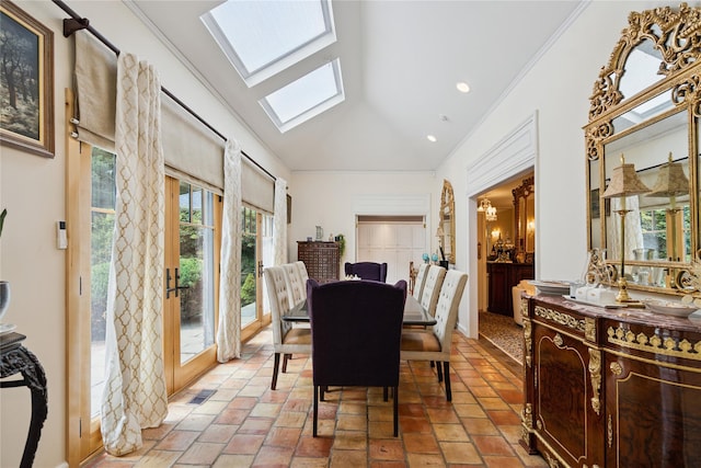 10 Laurel Woods Dr, Upper Brookville, NY 11771 - dining area with a skylight, crown molding, and vaulted ceiling