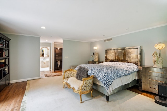 10 Laurel Woods Dr, Upper Brookville, NY 11771 - bedroom featuring wood finished floors, ornamental molding, and recessed lighting