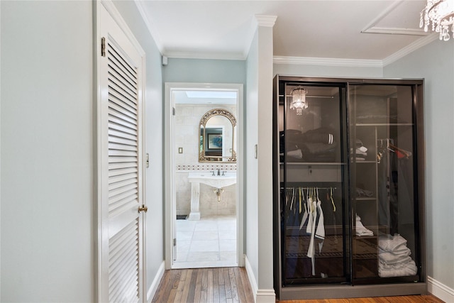 10 Laurel Woods Dr, Upper Brookville, NY 11771 - hall with ornamental molding and wood finished floors