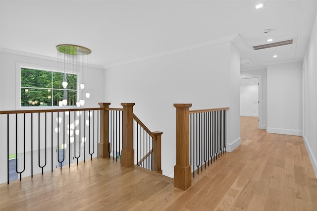 32A Pine Rd, Syosset, NY 11791 - hallway with an upstairs landing, crown molding, wood finished floors, and recessed lighting