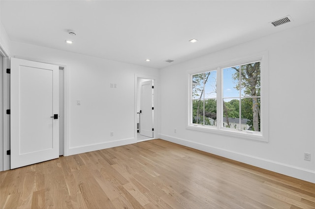 32A Pine Rd, Syosset, NY 11791 - empty room with light wood-type flooring and recessed lighting