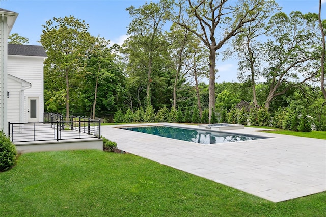 32A Pine Rd, Syosset, NY 11791 - view of pool with a patio area, a yard, and a pool with connected hot tub