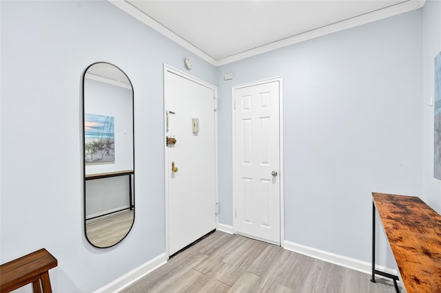 10 Bryant Cres Unit 1J, White Plains, NY 10605 - entryway featuring light wood-type flooring and ornamental molding