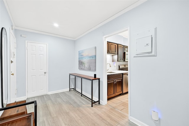 10 Bryant Cres Unit 1J, White Plains, NY 10605 - hall featuring light wood finished floors and ornamental molding