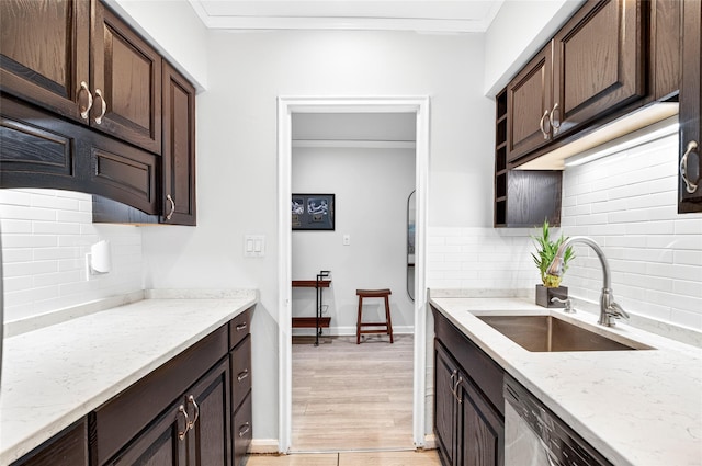 10 Bryant Cres Unit 1J, White Plains, NY 10605 - kitchen featuring backsplash, light stone counters, dishwasher, light wood-style floors, and dark brown cabinetry